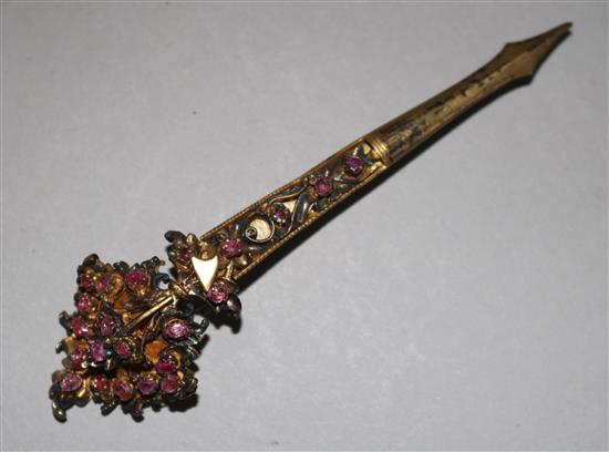 A gilt metal and pink stone set brooch, 4in.